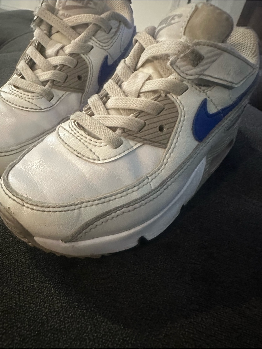 Nike Kids White Sneakers with Blue Swoosh